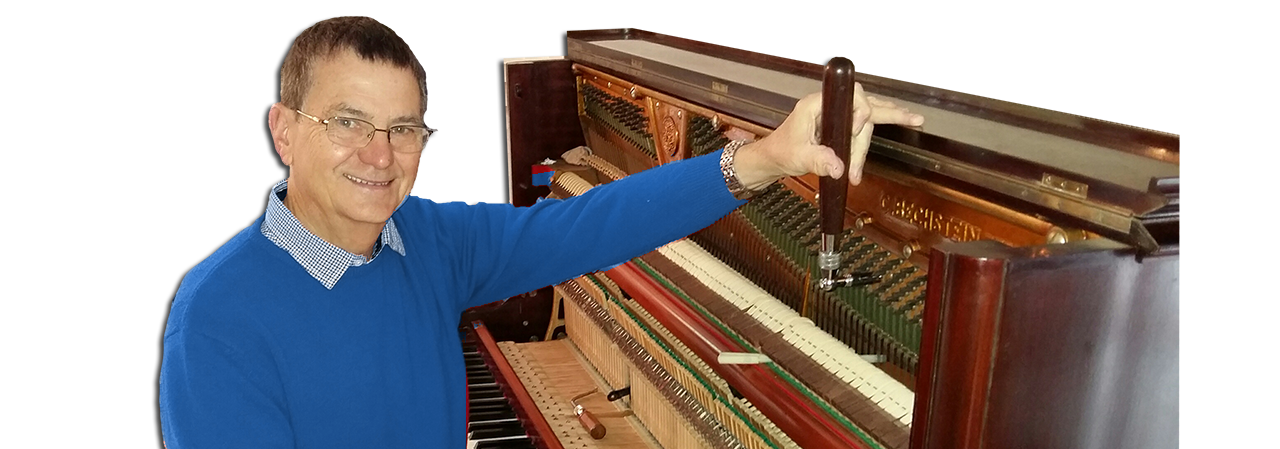 Keith Macfarlane, piano tuner in Cape Town, tuning an upright piano